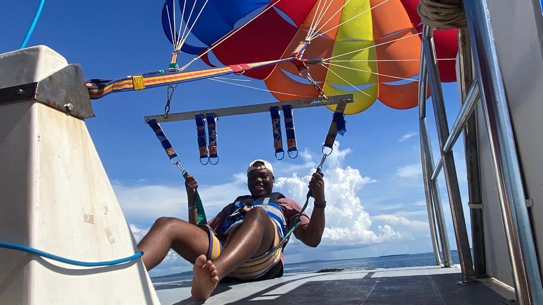 Parasailing high above the ocean with breathtaking views